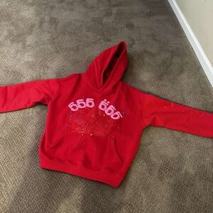 Vibrant Red Hooded Sweatshirt with Long Sleeves and Front Design
